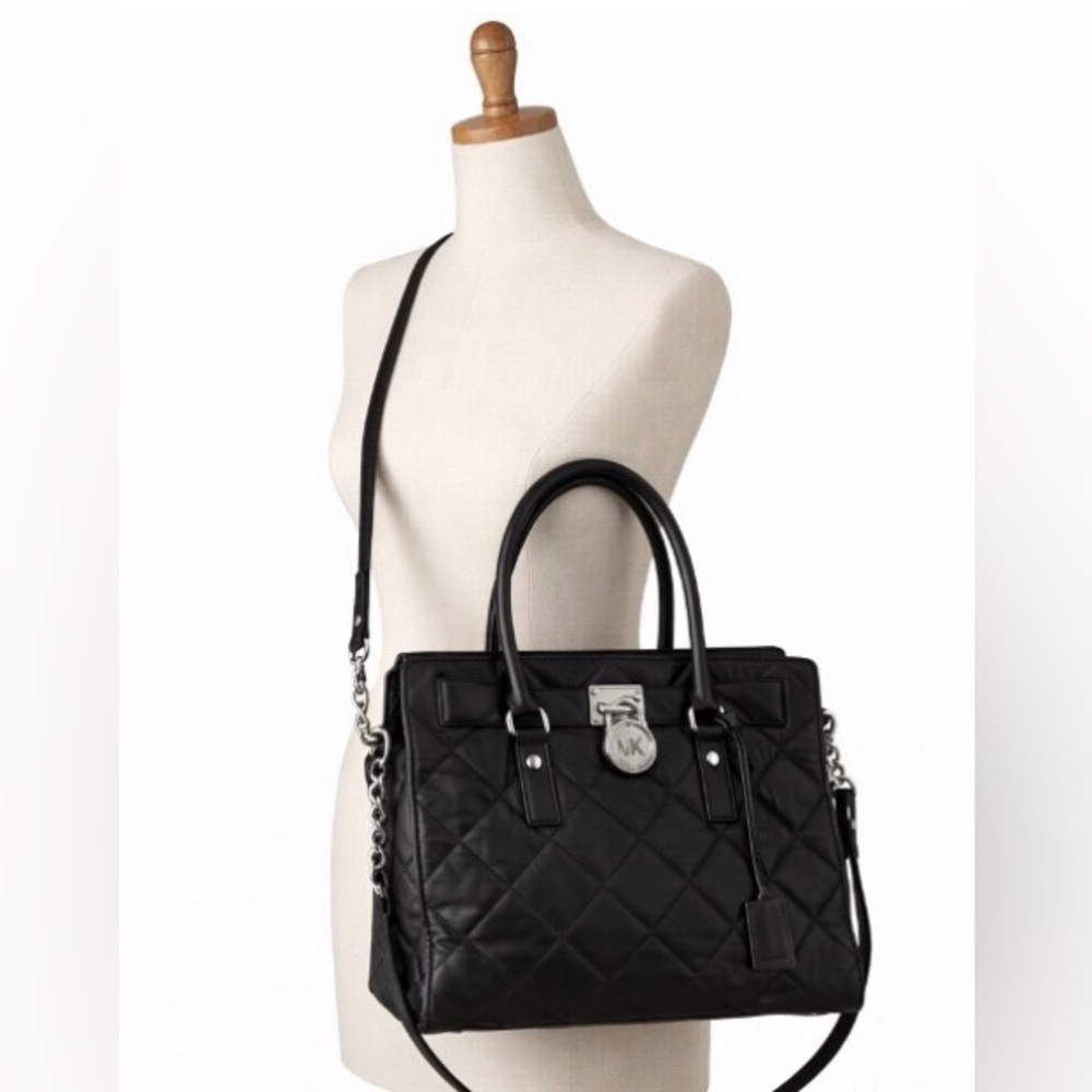 Michael Kors Quilted Black Leather Satchel With Lock Charm.